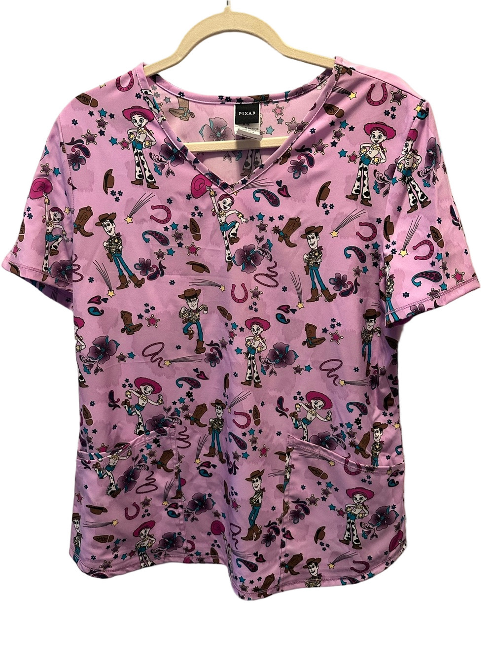 Pixar Toy Story Jessie Woody Pink Scrub Top V Neck Medical Uniform NWT